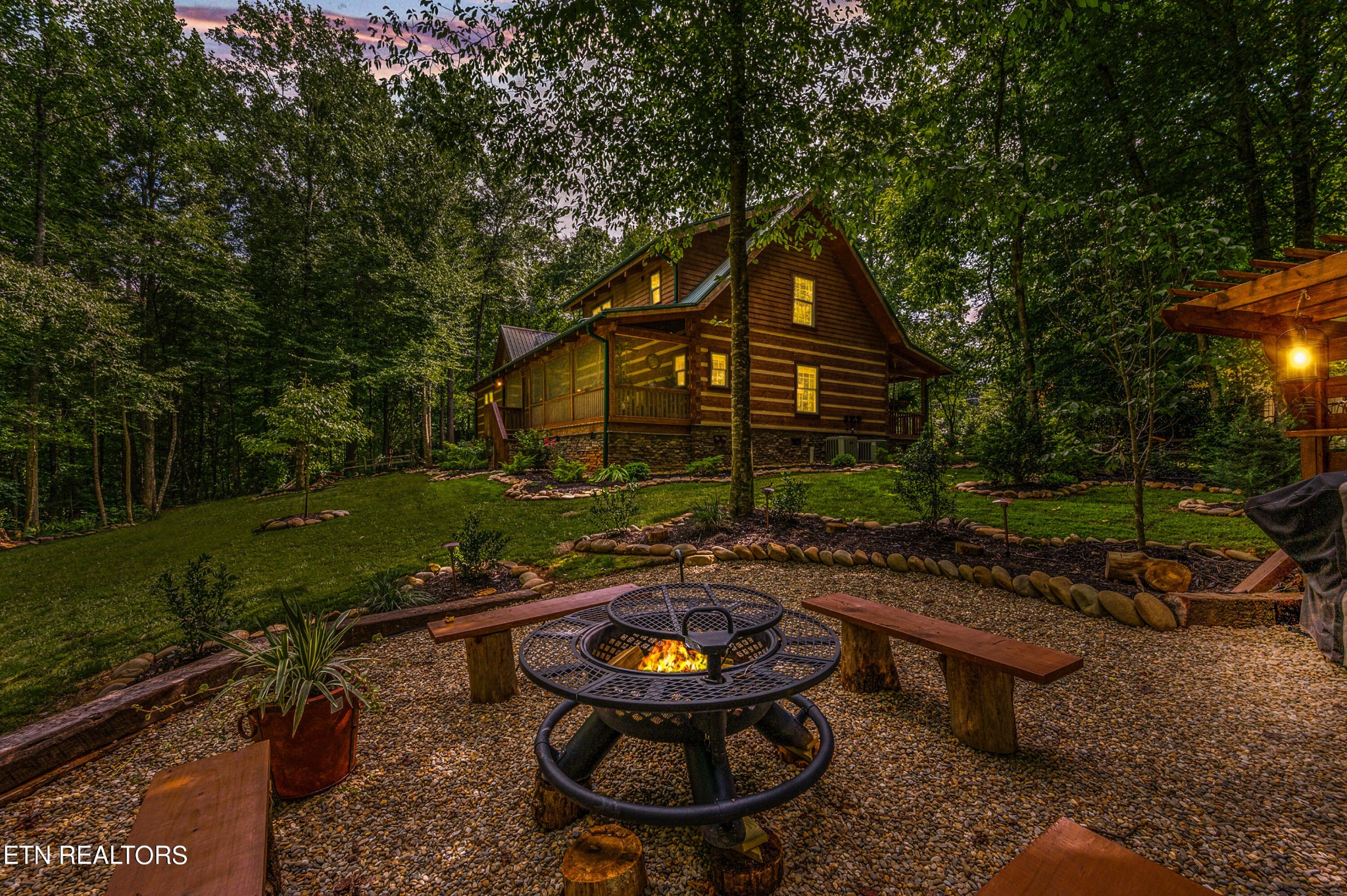 144 Lakeside Townsend, TN 37882 - Photo 3 of 56 a backyard of a house with fountain table and chairs