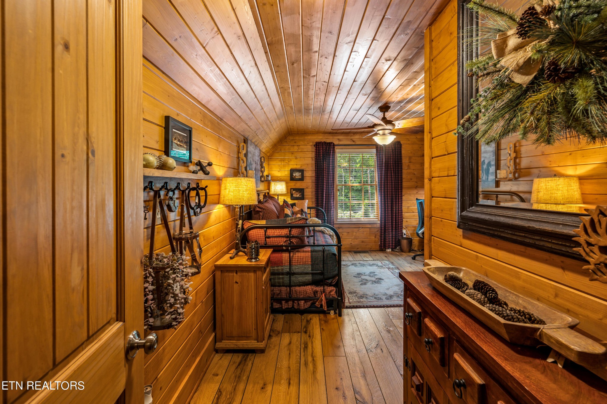 144 Lakeside Townsend, TN 37882 - Photo 40 of 56 a view of a balcony with chairs and wooden floor