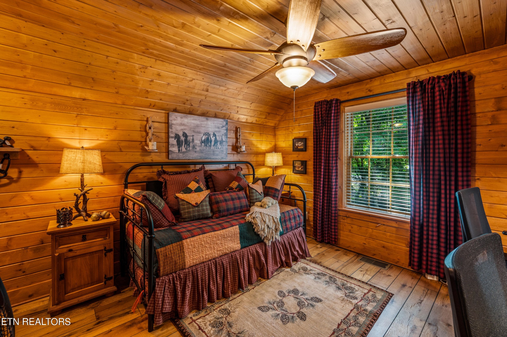 144 Lakeside Townsend, TN 37882 - Photo 42 of 56 a bedroom with furniture and a window