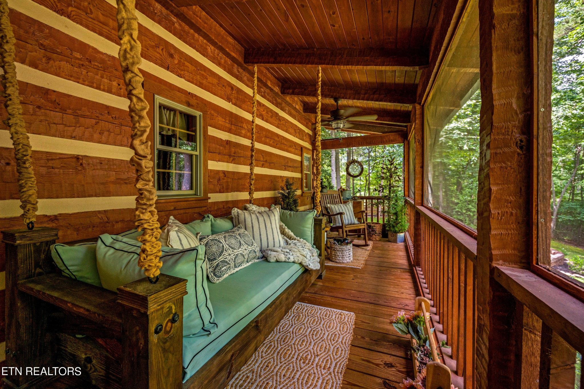 144 Lakeside Townsend, TN 37882 - Photo 45 of 56 a balcony with furniture and wooden floor