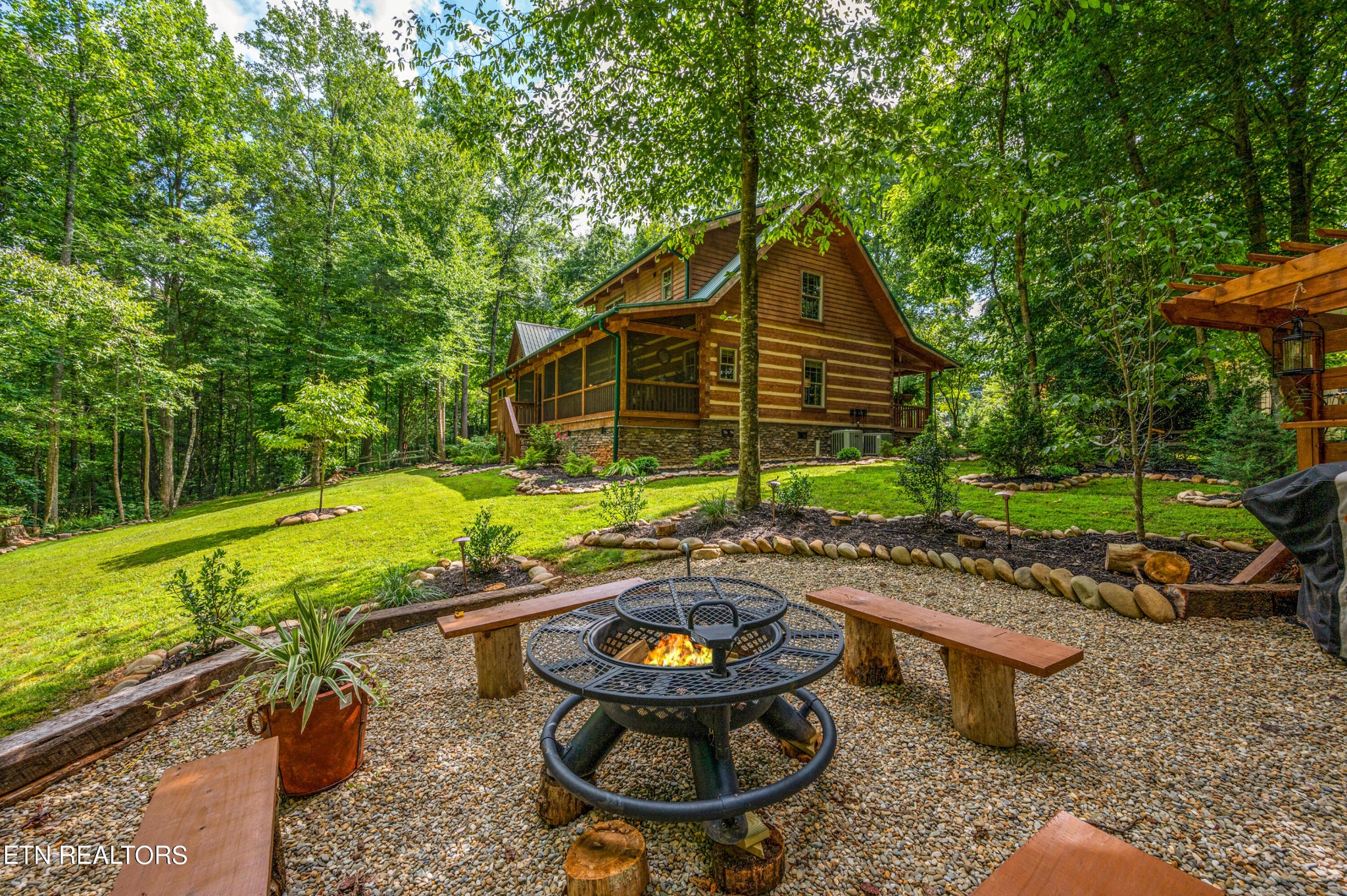 144 Lakeside Townsend, TN 37882 - Photo 51 of 56 a view of a chair and tables in the backyard