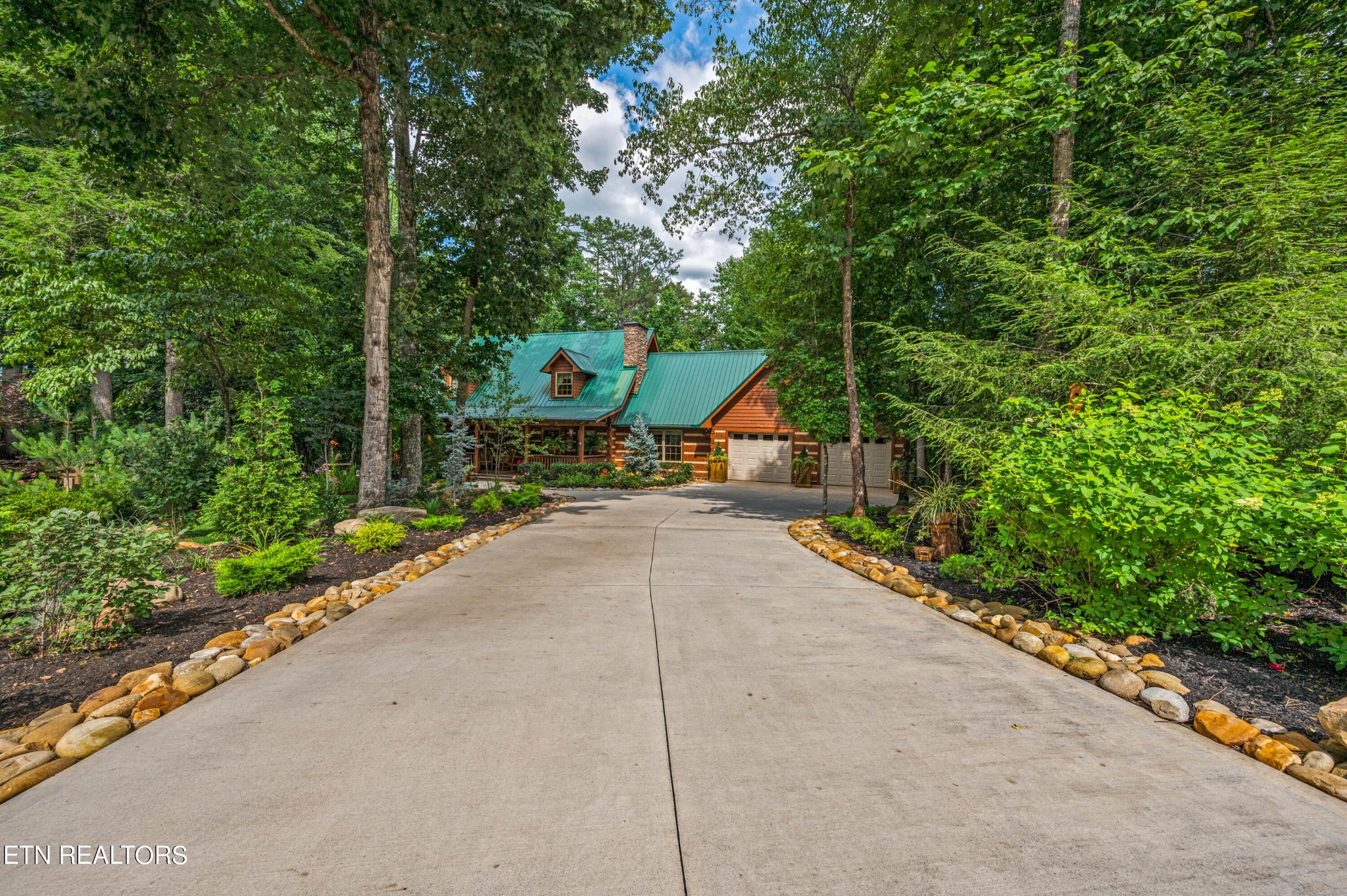 144 Lakeside Townsend, TN 37882 - Photo 56 of 56 a wooden bench sitting in front of a building