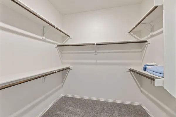 a bathroom with a sink vanity and a mirror