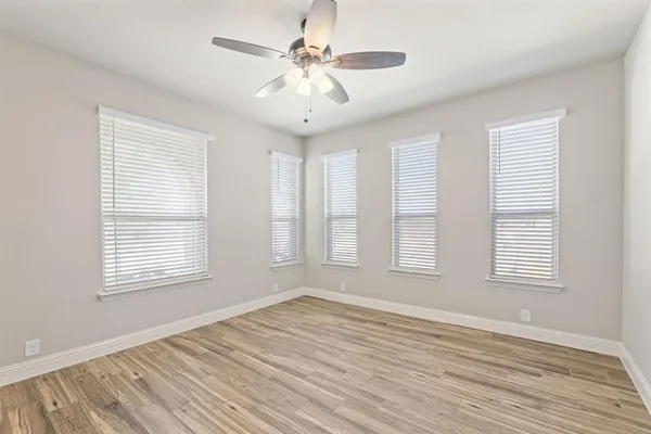 a view of entryway with wooden floor and stairs