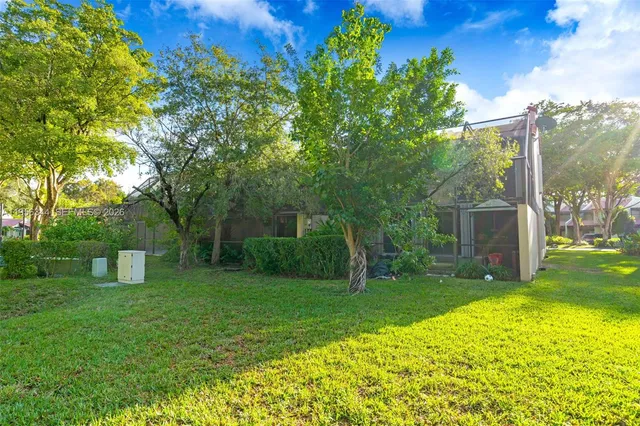 a view of a backyard with a garden
