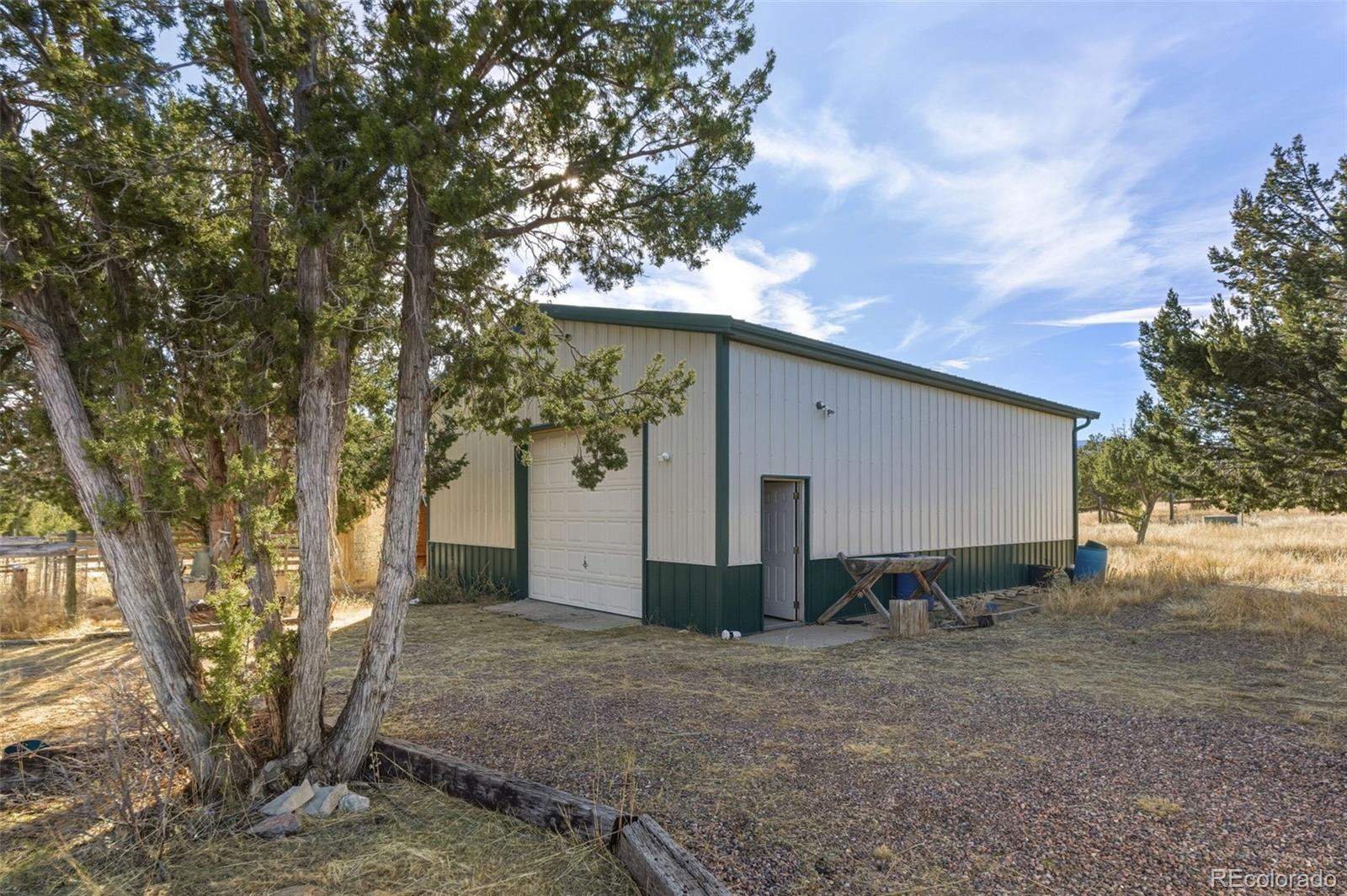 2925 Siloam Road Pueblo, CO 81005 - Photo 36 of 44 a view of a house with a yard