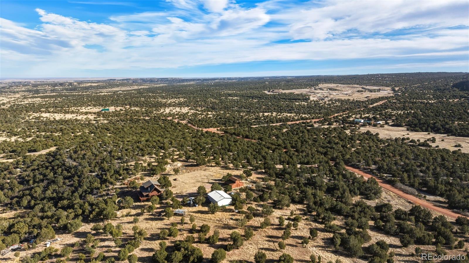 2925 Siloam Road Pueblo, CO 81005 - Photo 41 of 42 an aerial view of residential building with parking space