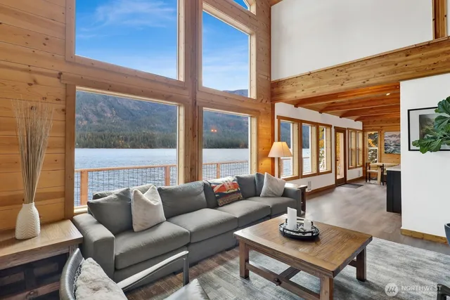 a view of balcony with wooden floor and fence