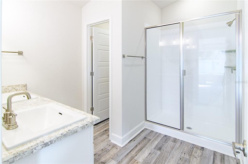 30 Priory Lane Palm Coast, FL 32164 - Photo 16 of 31 a bathroom with a sink and a mirror