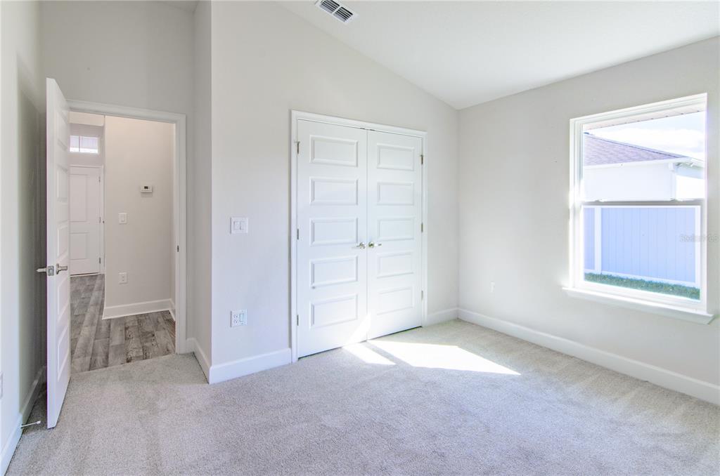 30 Priory Lane Palm Coast, FL 32164 - Photo 24 of 31 an empty room with windows