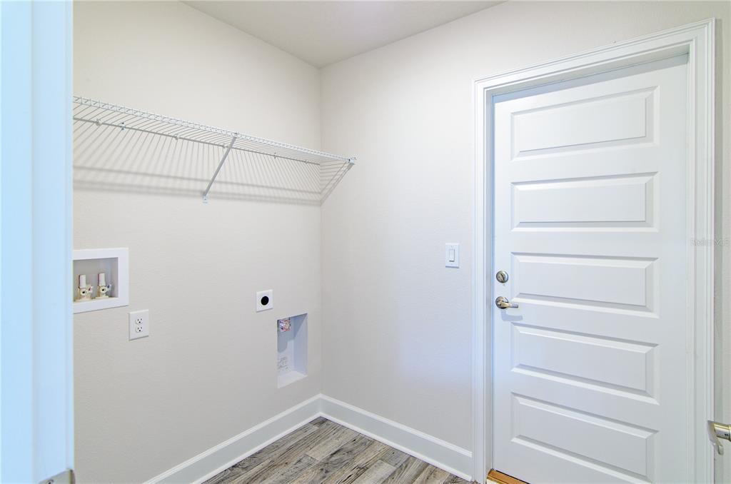 30 Priory Lane Palm Coast, FL 32164 - Photo 10 of 31 a view of small space with racks on the wall