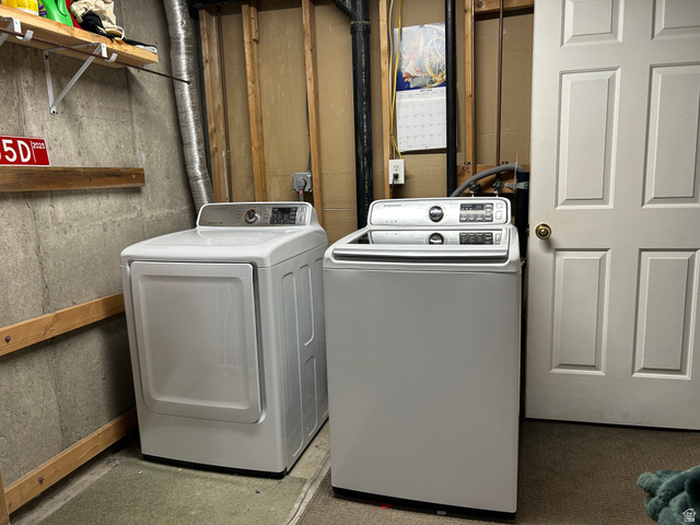 7659 State Street Midvale, UT 84047 - Photo 25 of 33 Laundry area with washing machine and dryer