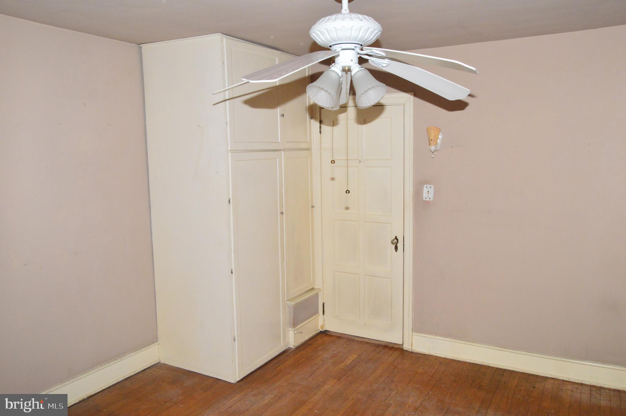 304 North 25th Street Reading, PA 19606 - Photo 14 of 31 a view of a chandelier fan and wooden floor