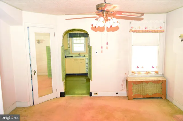 a utility room with cabinets a washer and dryer