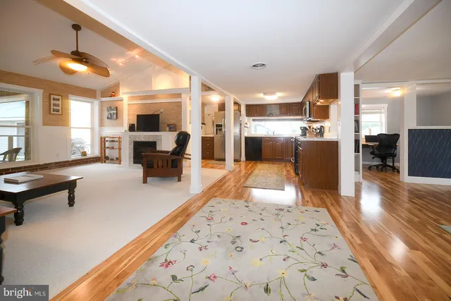 a living room with furniture and a table