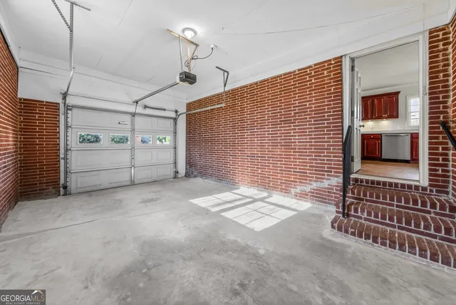 a kitchen with stainless steel appliances granite countertop a stove sink and cabinets