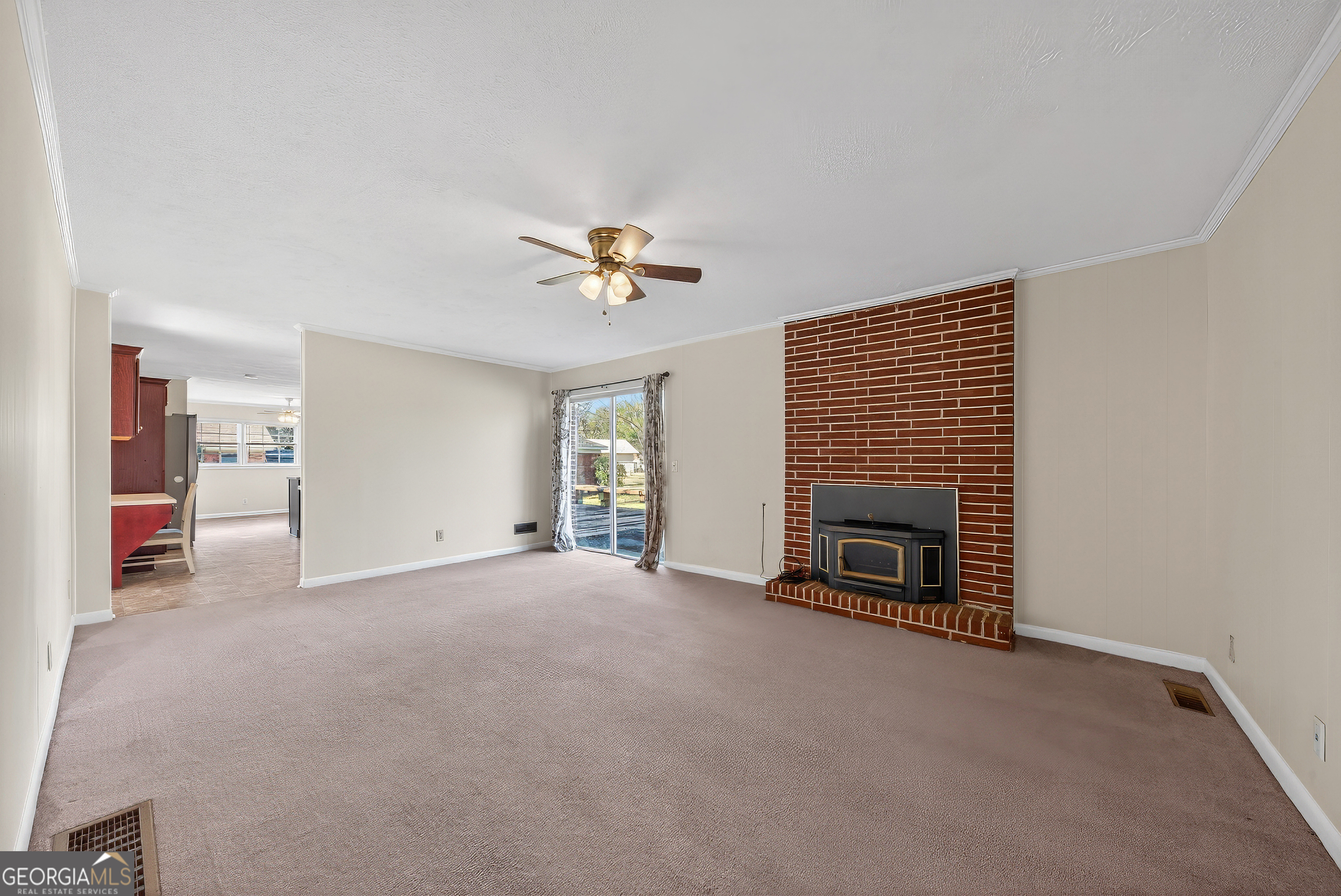 741 East Avenue Madison, GA 30650 - Photo 19 of 40 a view of a livingroom with a fireplace