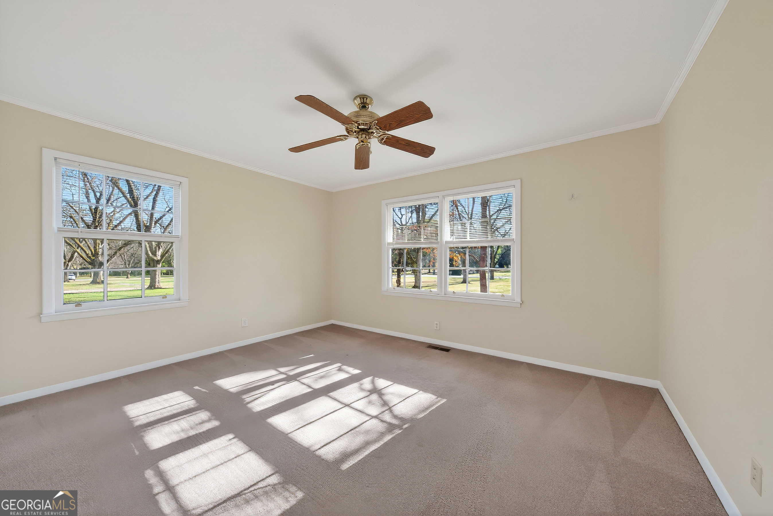 741 East Avenue Madison, GA 30650 - Photo 24 of 40 a view of empty room with window