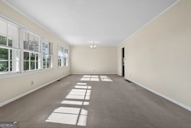 an empty room with windows