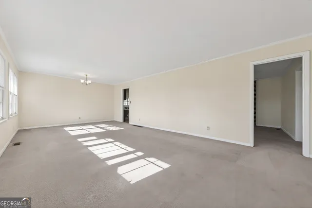 a view of a yard with wooden deck