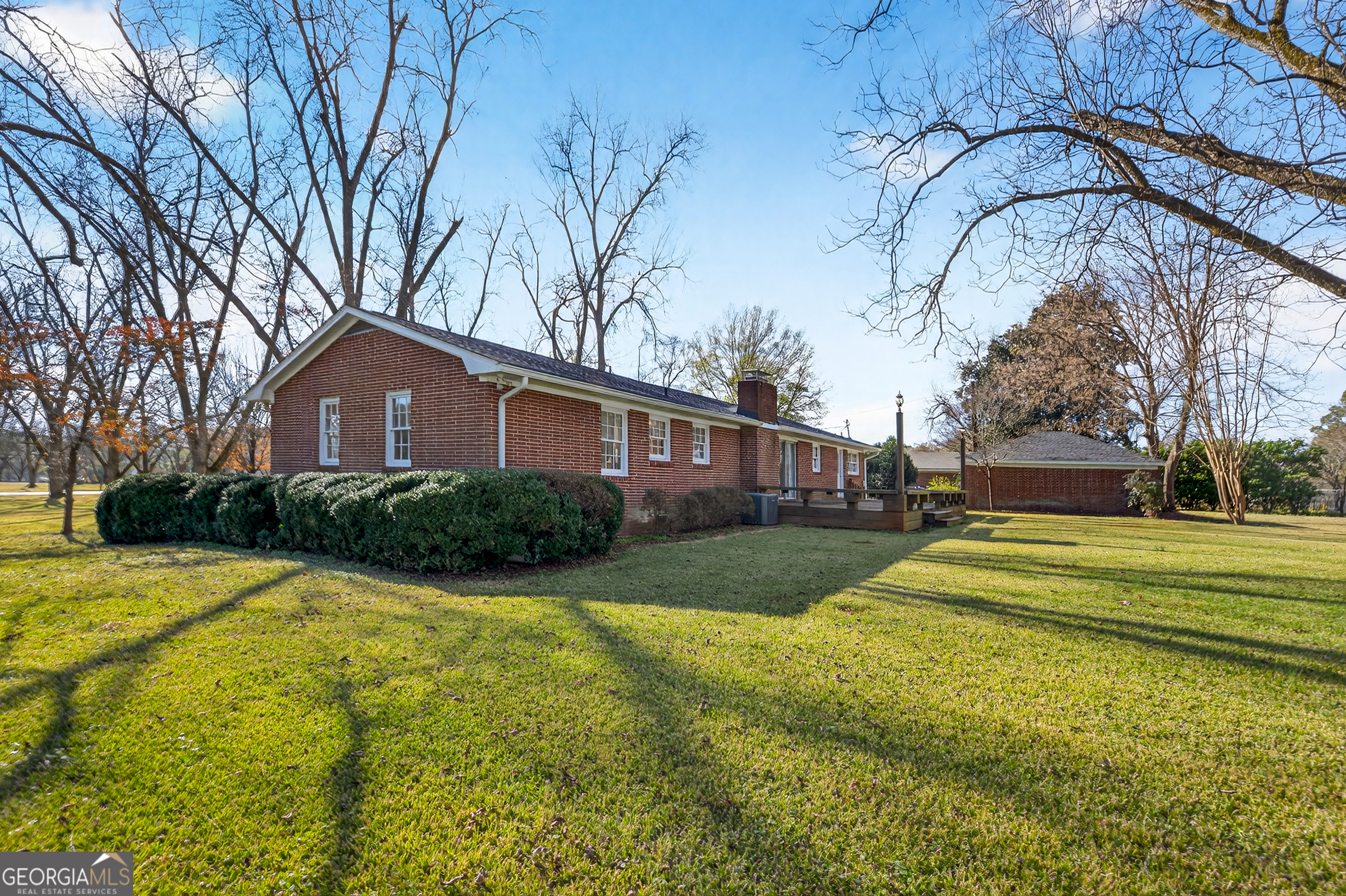 741 East Avenue Madison, GA 30650 - Photo 35 of 40 a view of a house with a big yard