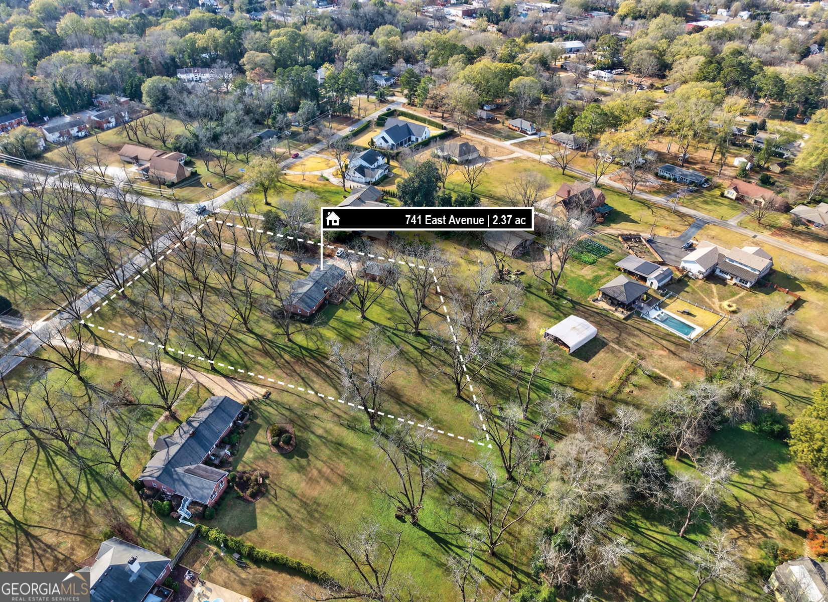 741 East Avenue Madison, GA 30650 - Photo 40 of 40 an aerial view of residential houses with outdoor space
