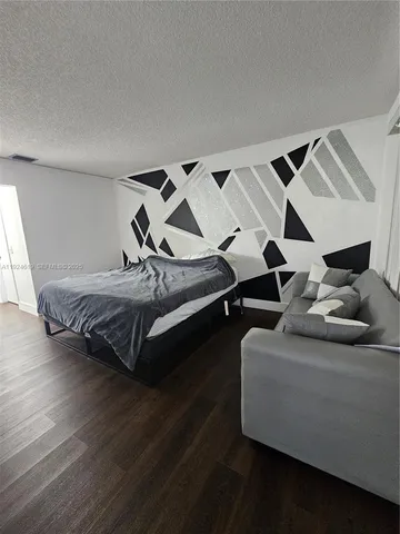 a bedroom with furniture and a couch