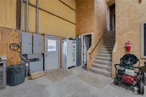 a view of a hallway with stairs