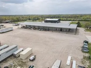 a view of a terrace with outdoor seating and city view