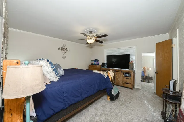 a bathroom with a granite countertop sink mirror and vanity