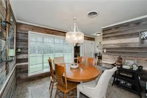 a kitchen with a refrigerator and a sink
