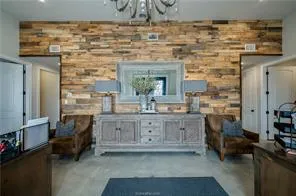 a bathroom with a granite countertop sink a vanity and a mirror