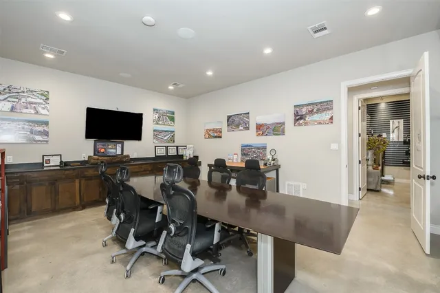 a kitchen with stainless steel appliances granite countertop a stove and a refrigerator