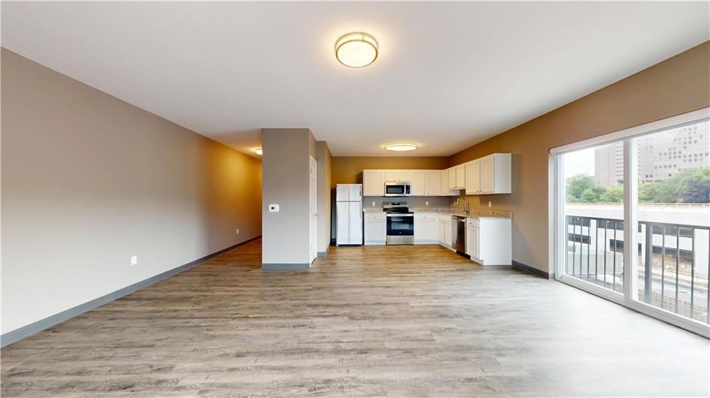 1450 Fifth Avenue, Unit 300 Pittsburgh, PA 15219 - Photo 15 of 24 a view of kitchen with wooden floor