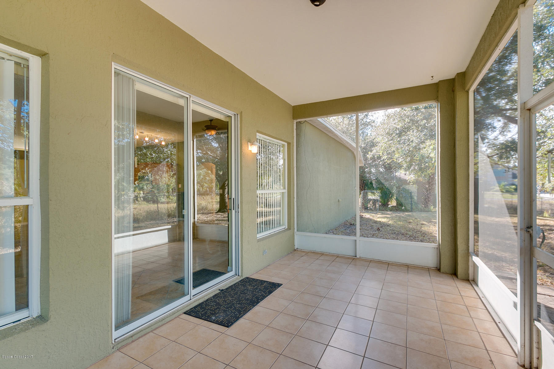 2992 Tishman Road Southeast Palm Bay, FL 32909 - Photo 23 of 28 Screened Porch