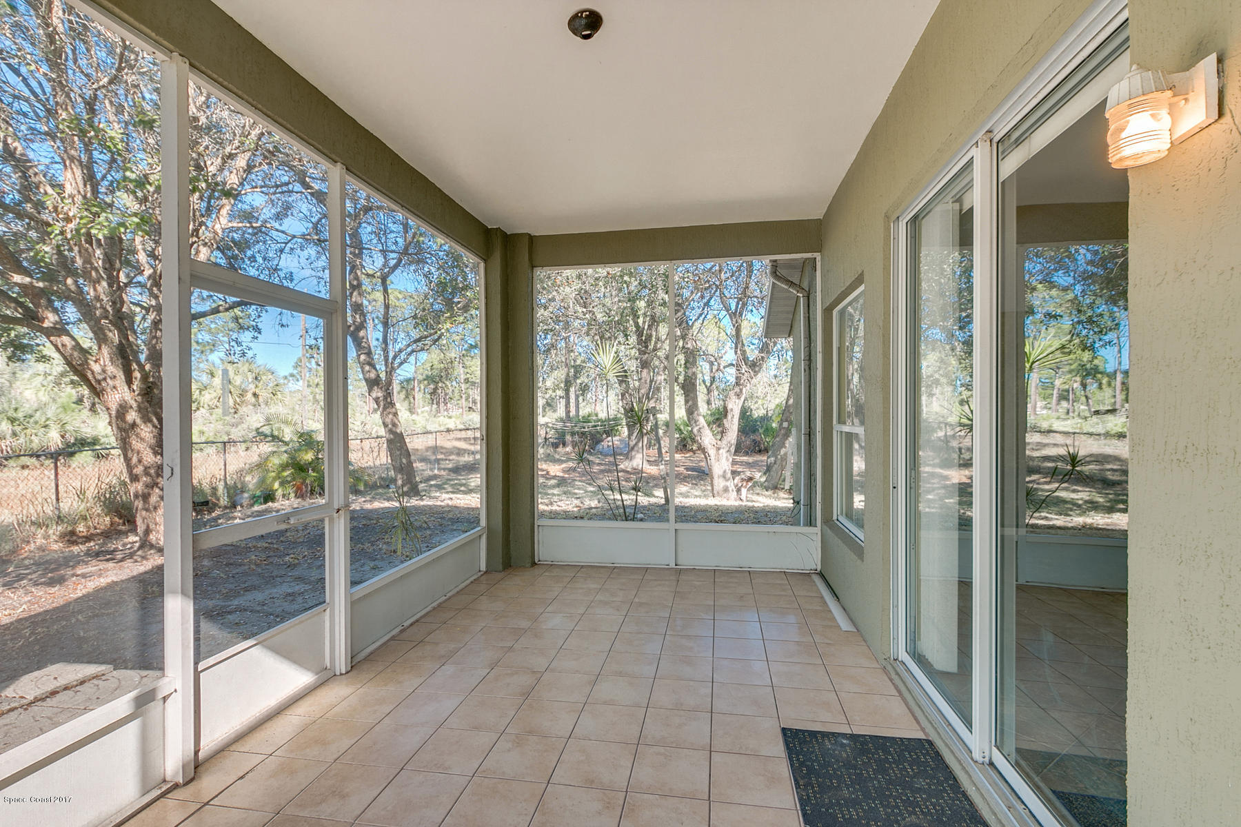 2992 Tishman Road Southeast Palm Bay, FL 32909 - Photo 24 of 28 Screened Porch