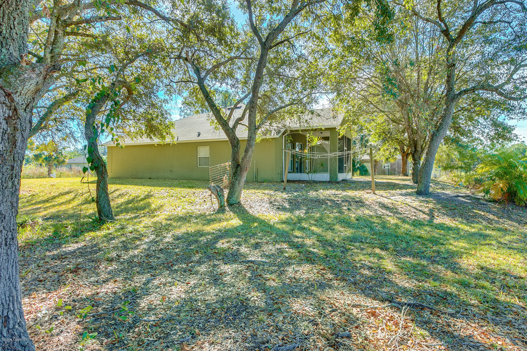 2992 Tishman Road Southeast Palm Bay, FL 32909 - Photo 26 of 28 Mature Landscaping