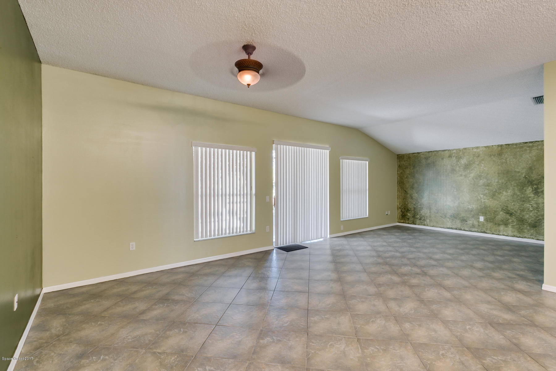2992 Tishman Road Southeast Palm Bay, FL 32909 - Photo 10 of 28 Family Room