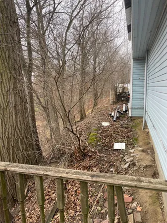 a view of a backyard of the house