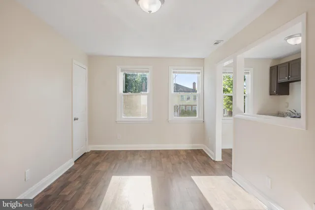 an empty room with windows