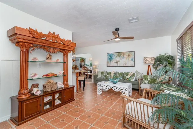 a kitchen with granite countertop a sink stainless steel appliances and cabinets