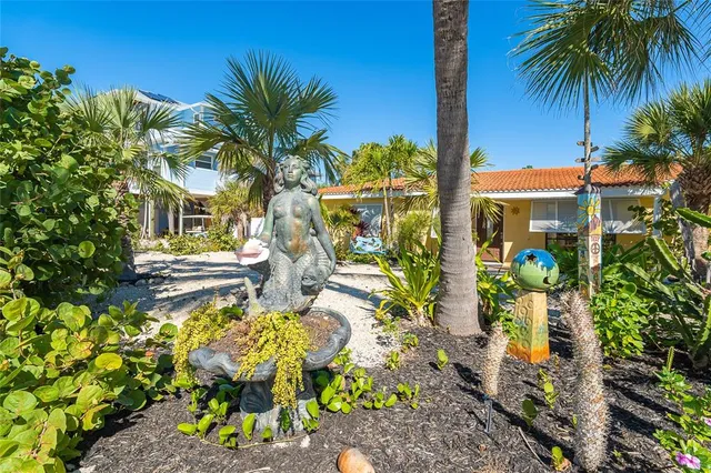 a front view of a house with patio