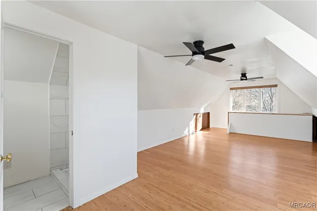 a bathroom with a sink a toilet and vanity