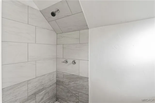 a room with a sink cabinets and utility room