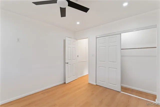a view of a house with wooden deck