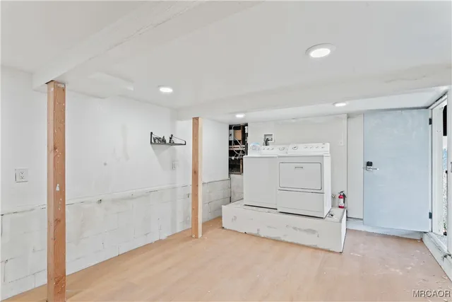 a view of a chairs on the roof deck