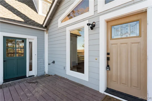 a view of a front door and outdoor space