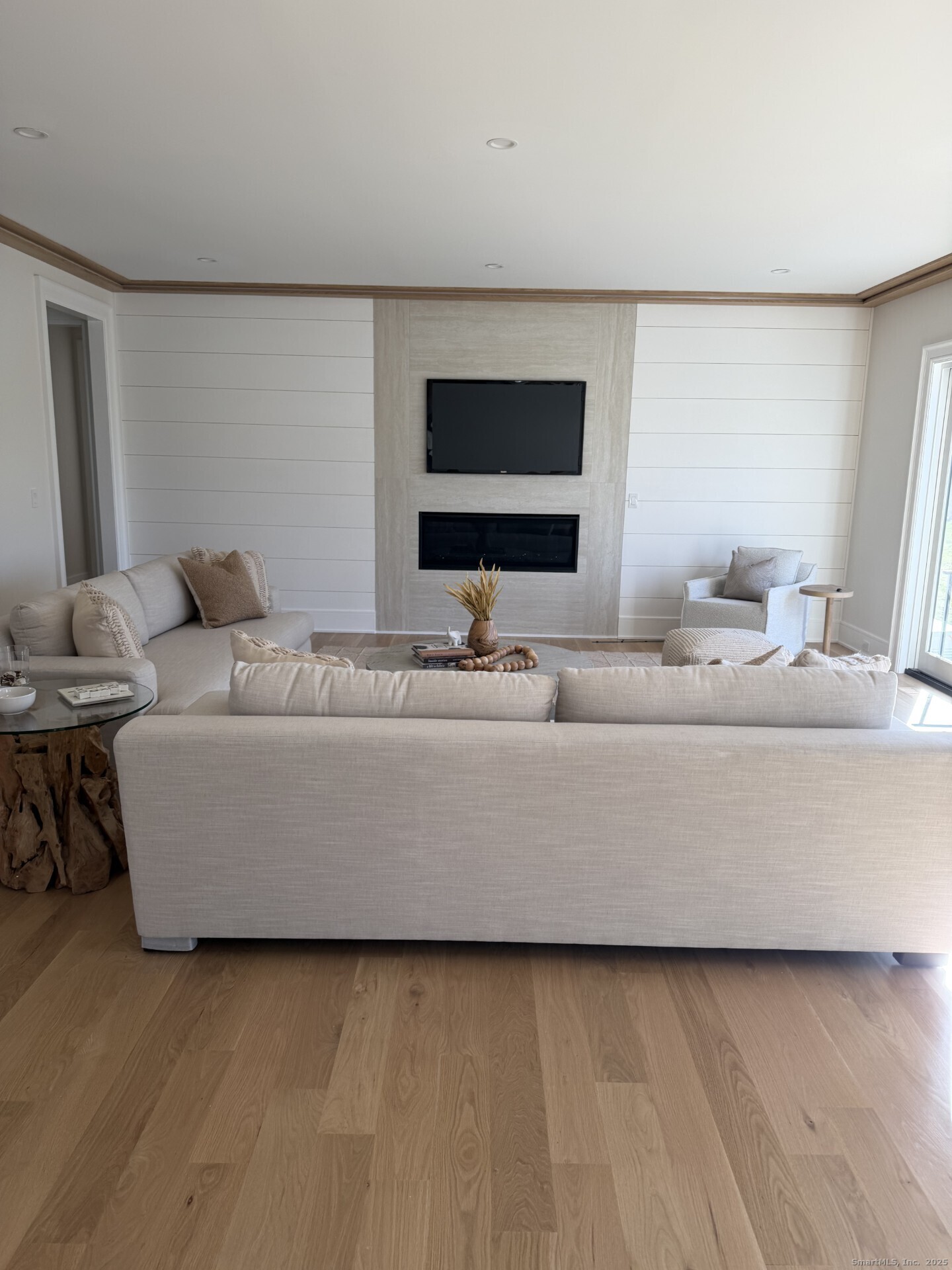 32 Webb Road Westport, CT 06880 - Photo 11 of 40 a living room with furniture and a flat screen tv