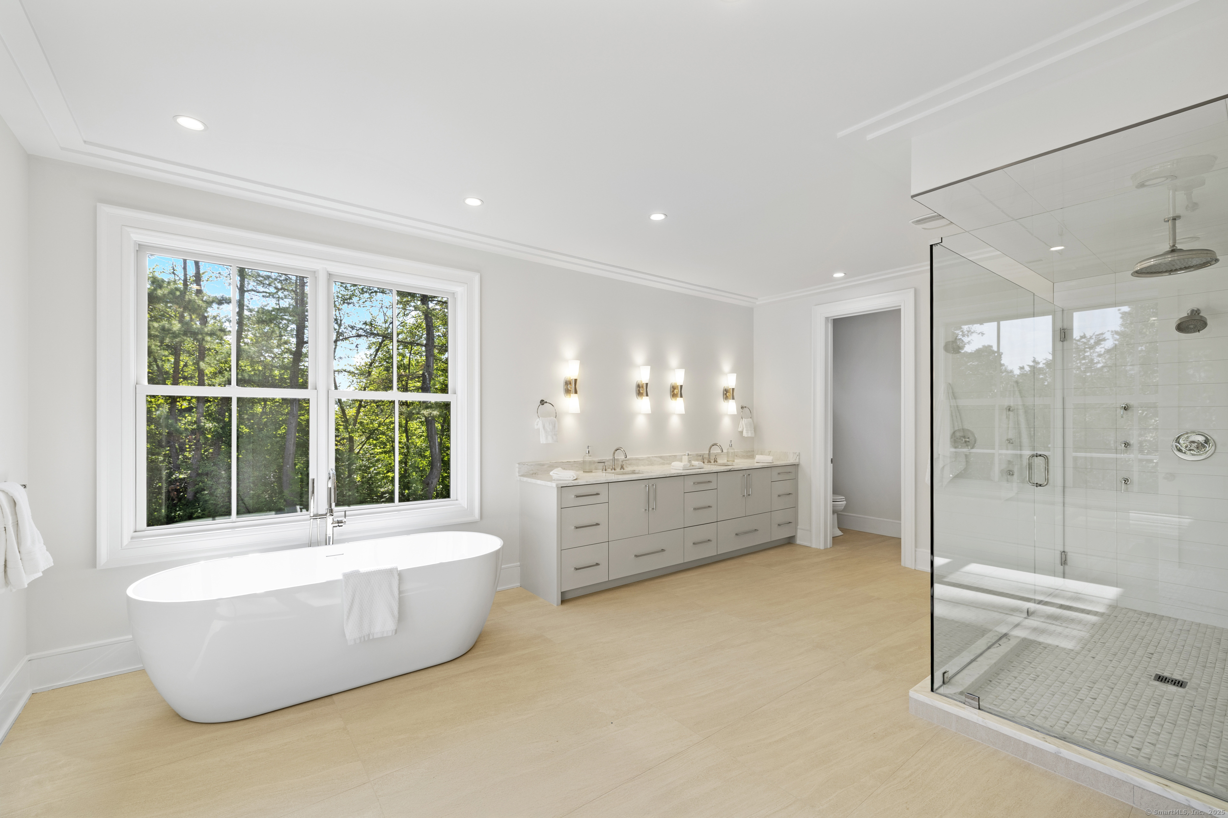 32 Webb Road Westport, CT 06880 - Photo 15 of 40 a large spacious bathroom with a tub and shower