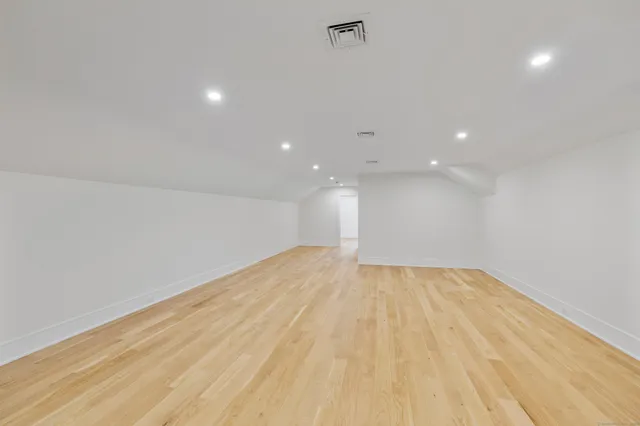 a view of a house with a roof deck